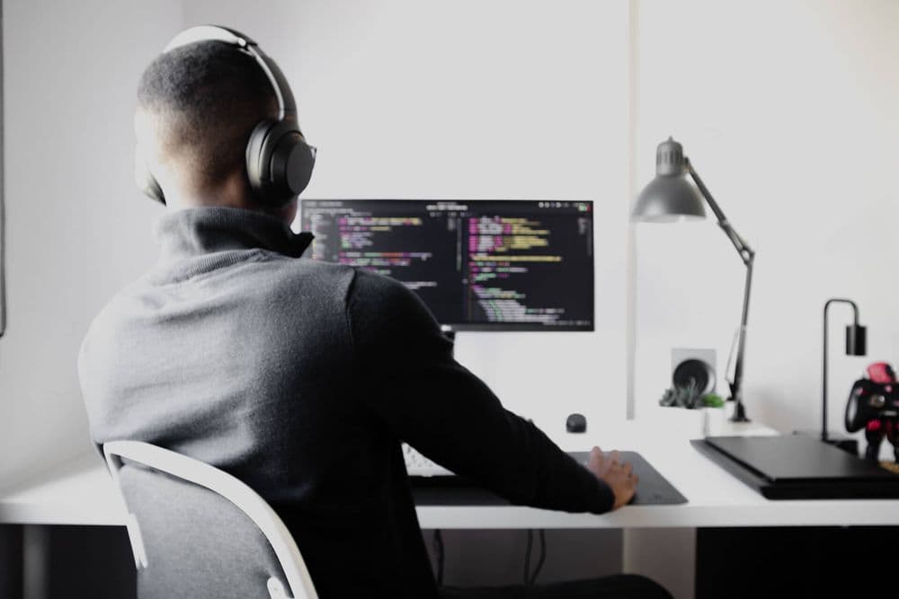 Developer at his desk. (Best Practices for Picking PostgreSQL Data Types)